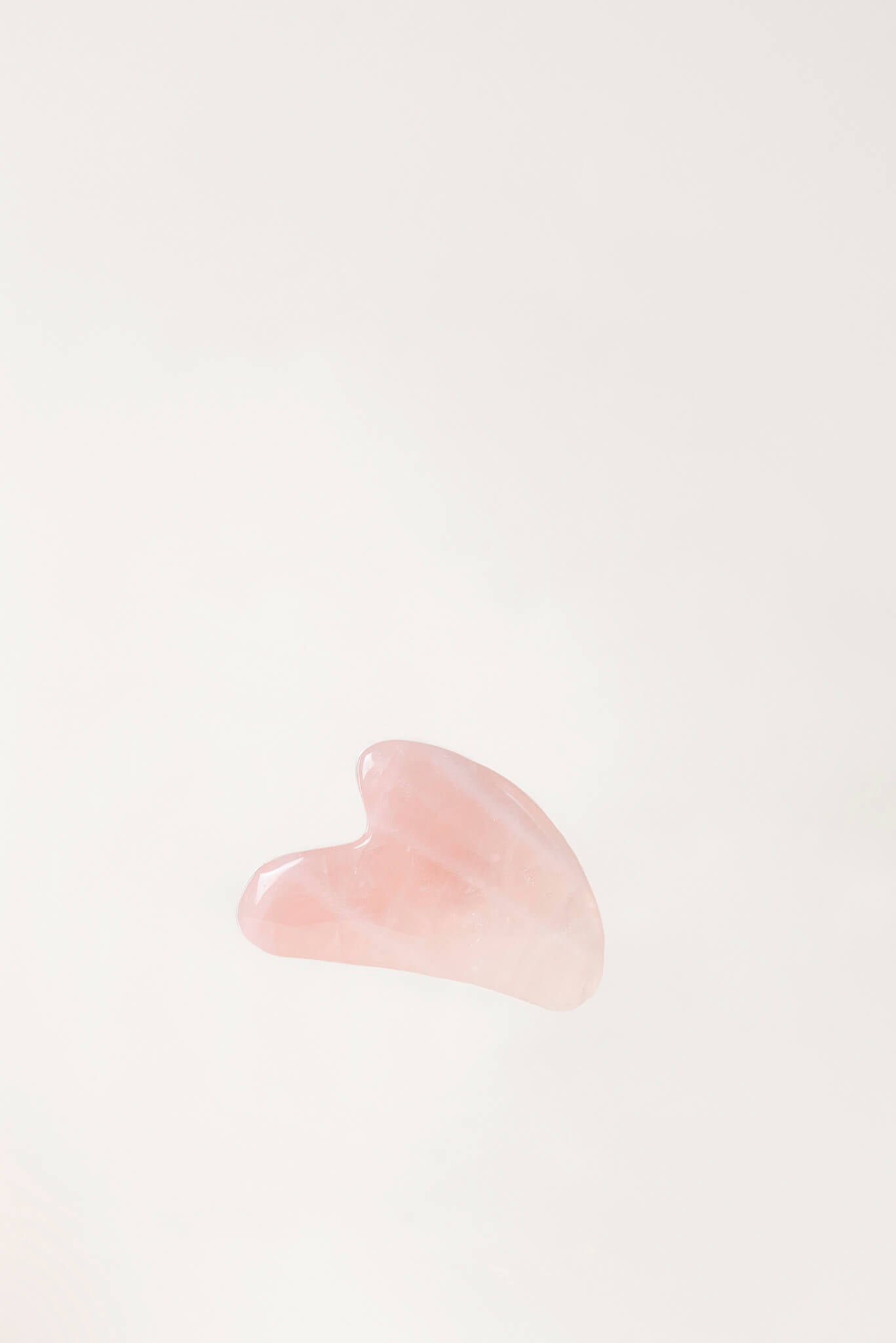 Kamień do masażu twarzy Gua Sha Różowy Kwarc